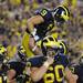 Michigan wide receiver Drew Dileo is lifted into the air after scoring a touchdown during the fourth quarter against Notre Dame at Michigan Stadium on Saturday, September 7, 2013. Michigan beat Notre Dame 41 - 30. Melanie Maxwell | AnnArbor.com